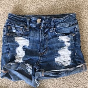 Ripped blue American Eagle shorts